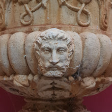 Load image into Gallery viewer, x SOLD A large and grand garden Urn with a repeat egg-and-dart pattern to the rim, detail gadrooning to the base of the bowl with Roman warrior faces.
