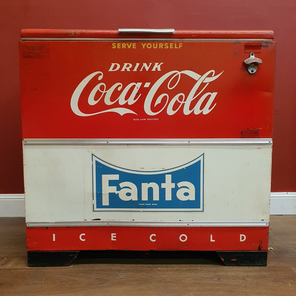 Vintage, almost antique 1950s Coco-Cola machine or fridge.