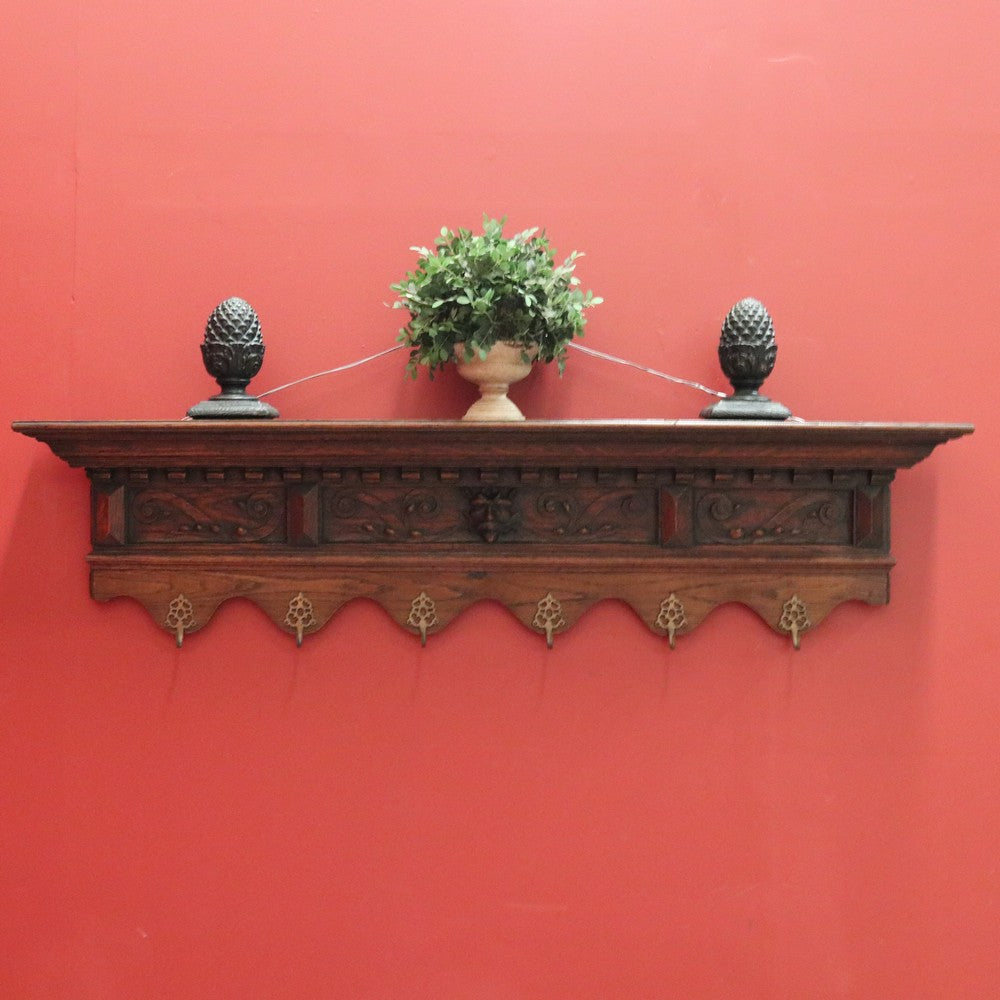 Antique French Oak Coat Rack with Brass Hooks and a Carved Greenman Centrepiece. B12037