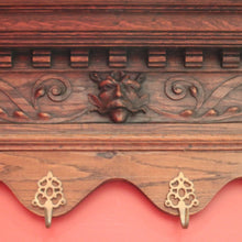 Load image into Gallery viewer, Antique French Oak Coat Rack with Brass Hooks and a Carved Greenman Centrepiece. B12037
