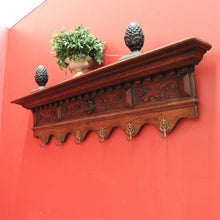 Load image into Gallery viewer, Antique French Oak Coat Rack with Brass Hooks and a Carved Greenman Centrepiece. B12037
