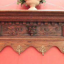 Load image into Gallery viewer, Antique French Oak Coat Rack with Brass Hooks and a Carved Greenman Centrepiece. B12037
