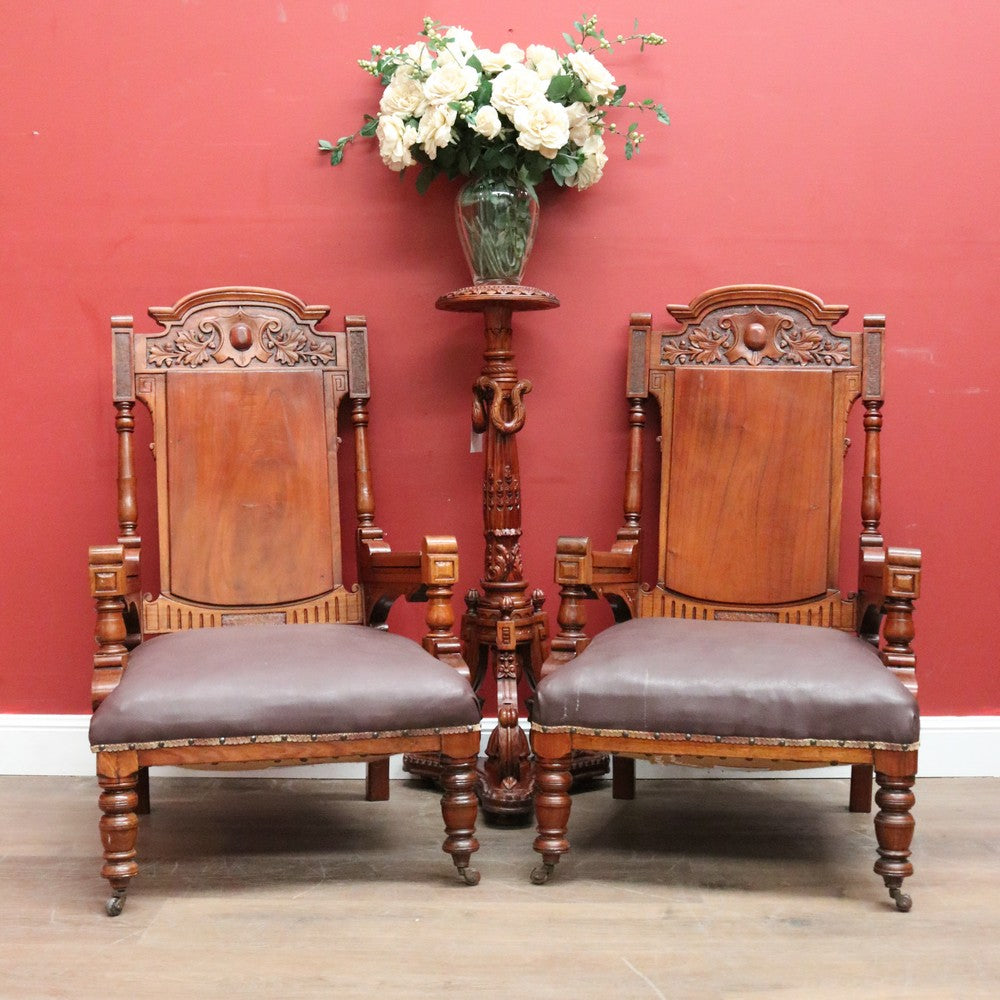 Pair of Antique Mahogany and Leather Armchairs, Carved detail, Castors. B12189