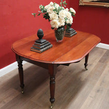 Load image into Gallery viewer, Antique Australian Cedar Drop Leaf Dining or Kitchen Table with Brass Castors. B12228
