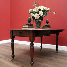 Load image into Gallery viewer, Antique Australian Cedar Drop Leaf Dining or Kitchen Table with Brass Castors. B12228
